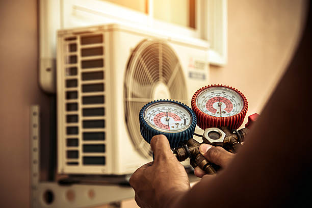 Professional Air Conditioning Service technician working in Pasadena, TX